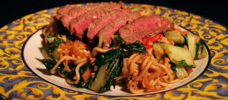 Mie goreng with a beef steak